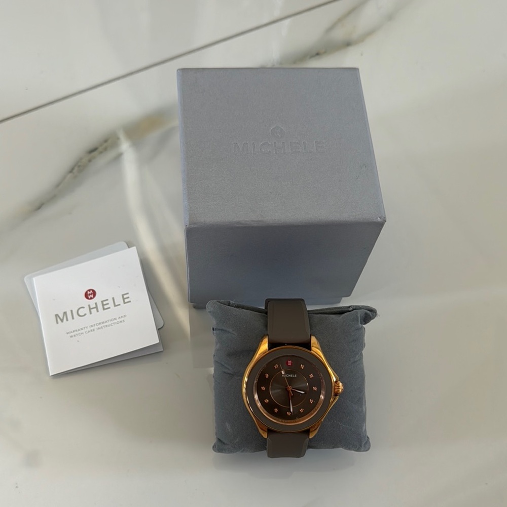 Michele Sunburst Cape Topaz Dial Ladies Watch. Luxurious Design